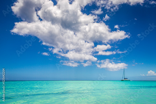 Tropical paradise: idyllic beach with sailboat, Punta Cana, Dominican Republic © Aide