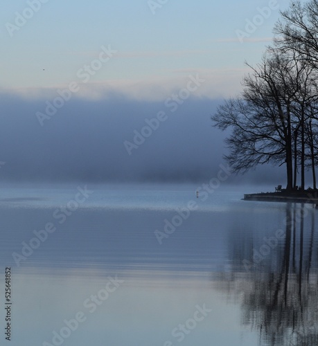 Morning fog on lake.