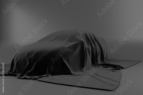 Fényképezés car hidden under black silk cloth cover in low light