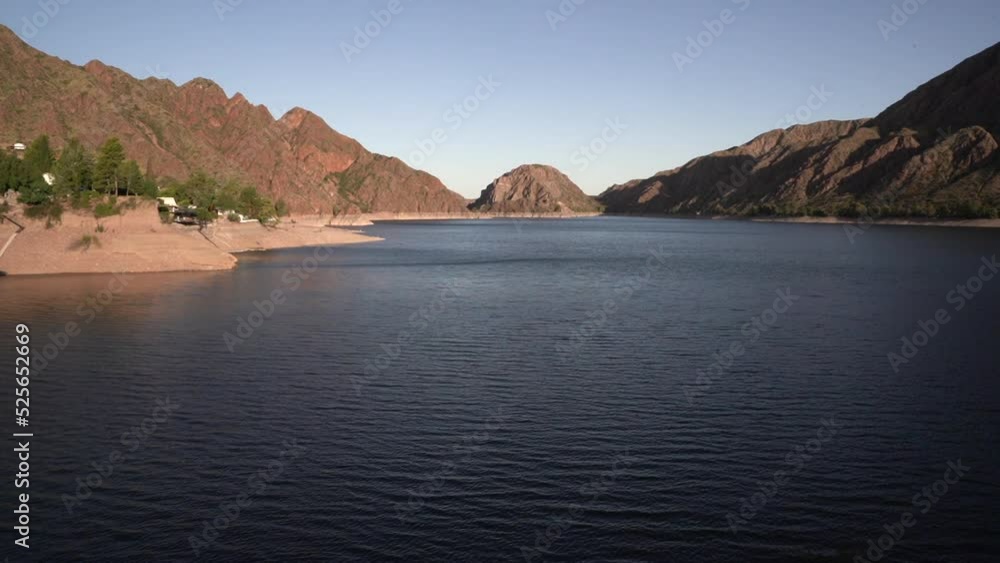 The lake and mountains in a sunny summer morning. The lake and mountains in a sunny summer morning.