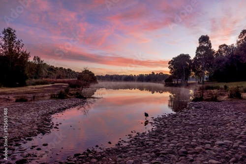 Beautiful view of a river near Glenmore Park, Australia at sunset photo