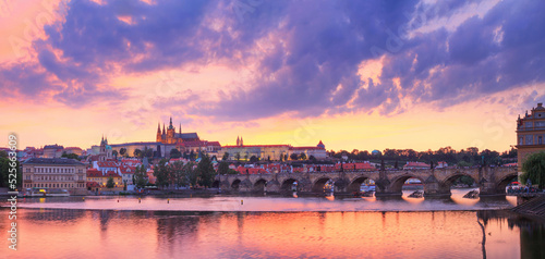 City summer landscape at sunset  panorama  banner - view of the Charles Bridge and castle complex Prague Castle in the historical center of Prague  Czech Republic