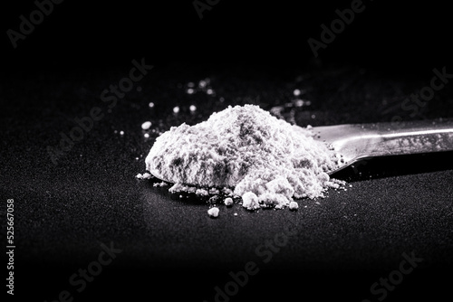 Phosphate, pile of phosphorous powder, used as a fertilizer or compost, for soil correction, or phosphating. Isolated background with copyspace