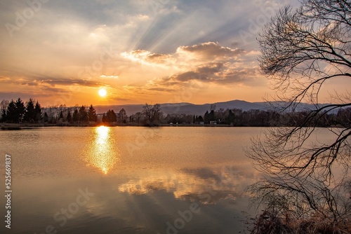 Fishing pond Badinsky Rybnik during sunset in the central Slovakia