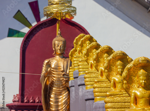 Golden buddha. is respected by those who see it in religion It is an Asian sculpture. photo