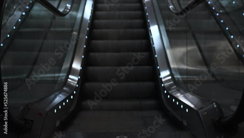 Electric escalator in metro. Moving staircase.