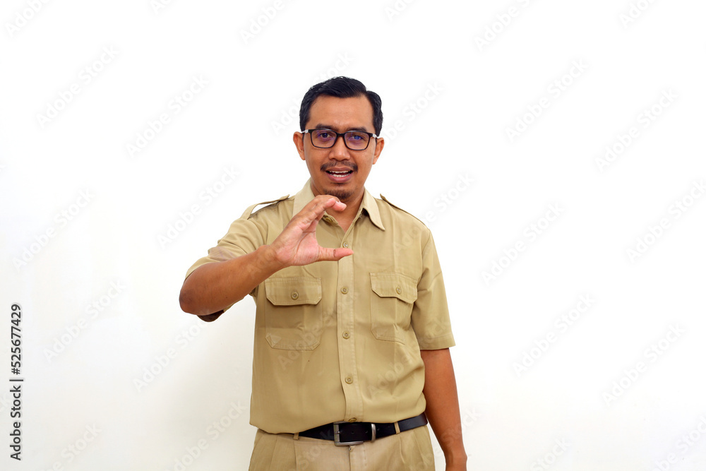 Indonesian government employees standing while gesturing letter C. Isolated on white background Indonesian government employees standing while gesturing letter C. Isolated on white background