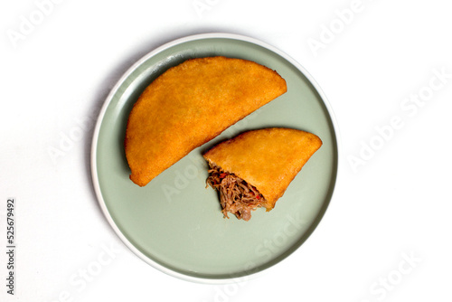 Fritish empanada stuffed with meat. Traditional food in Venezuela and Colombia
 photo