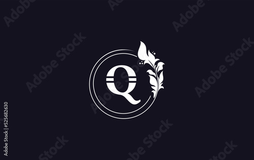 Golden leaf circle and creative logo design vector with the letters for professional brand and business Q