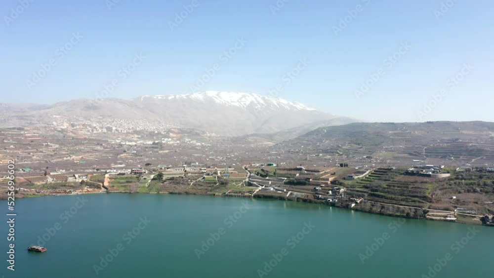 Snowy Hermon mountain and lake Ram in Northern Israel. Snowy Hermon mountain and lake Ram in Northern Israel.