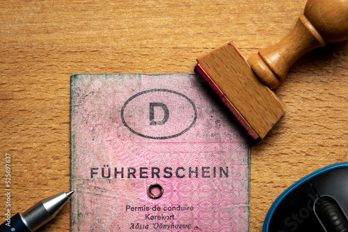 Oldenburg, Germany, August 22 2022, old used, dirty pink German driving license