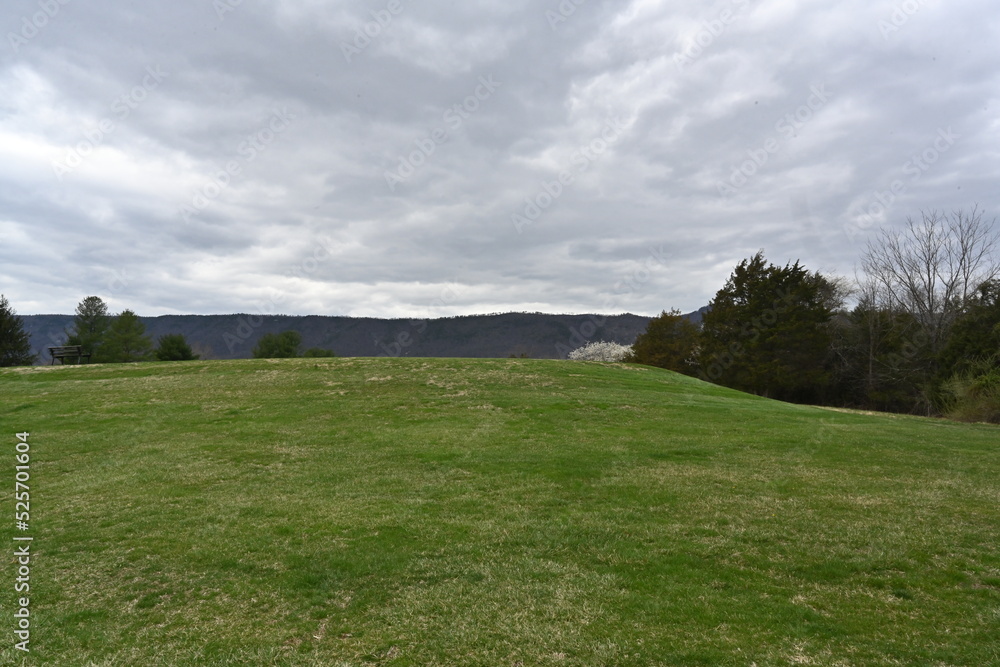 golf course in the mountains in the fall