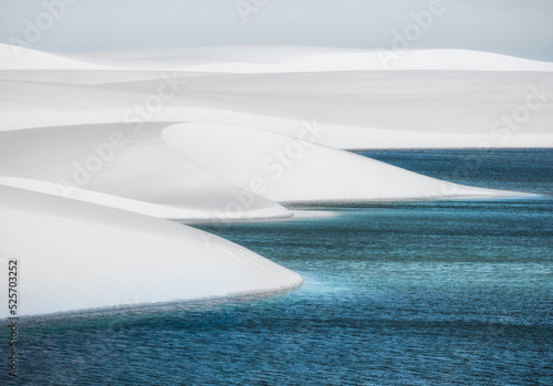 Fototapeta Naklejka Na Ścianę i Meble -   white sand dunes of Lencois Maranhenses with blue water pools