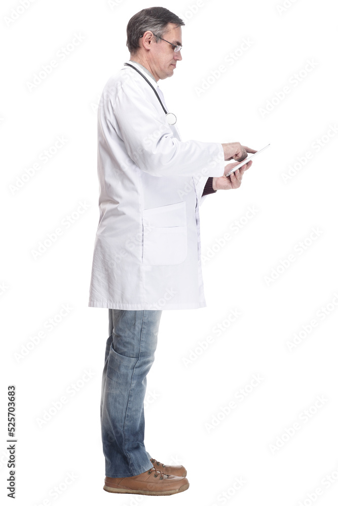 in full growth.qualified doctor with a digital tablet. in full growth.qualified doctor with a digital tablet.