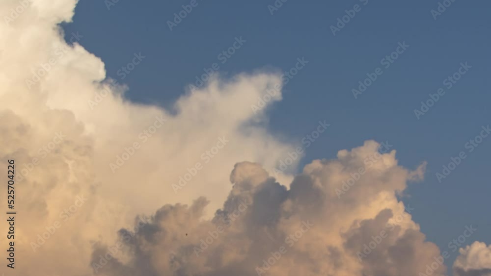 Clouds at sunset, amazing sky, nature background, time lapse.
Clouds at sunset, amazing sky, nature background, time lapse.