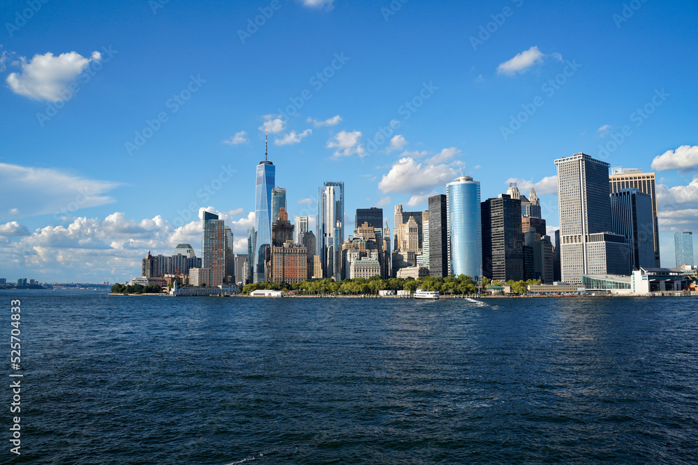 Manhattan skyscrapers view with cloudy sky