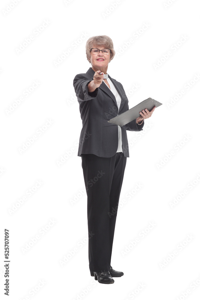 Side view of senior stylish businesswoman writing on clipboard Side view of senior stylish businesswoman writing on clipboard