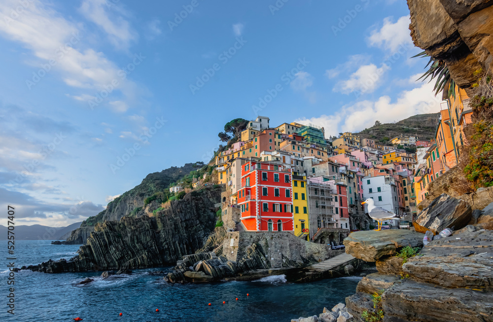 Riomaggiore cinque terre national park italian architecture colorful houses with blue sky and sea