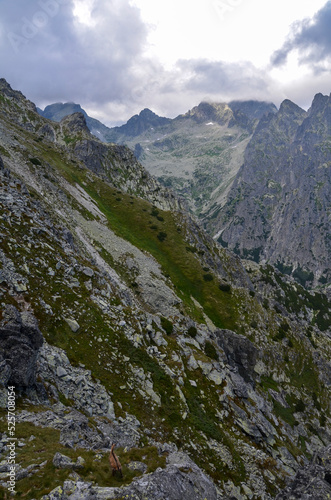 Mountain landscape in Slovakia, rocky mountain valley and climbing rocks with cloudy sky in the national park High Tatras