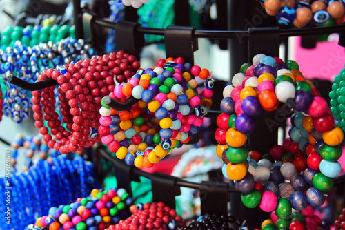 Hand bracelets and souvenirs on display at a street market in Antalya, Turkey