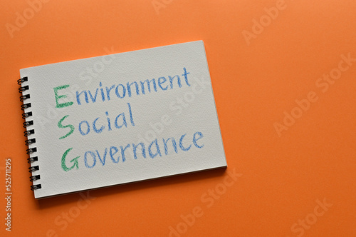 There is sketchbook with an illustration of Environment, Social, Governance.