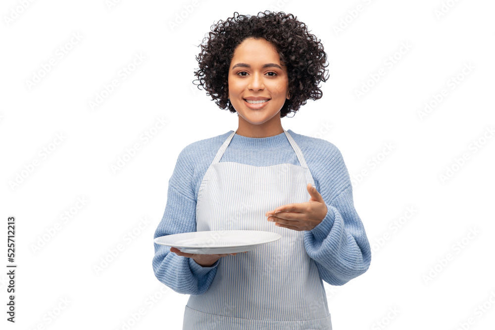 cooking, culinary and people concept - happy smiling woman in apron holding empty plate over white background cooking, culinary and people concept - happy smiling woman in apron holding empty plate over white background
