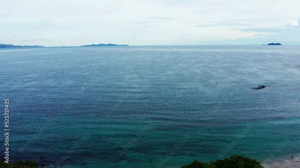 Aerial view of Koh Larn beach, Pattaya with blue turquoise seawater on the famous island of Koh Larn, Pattaya, Thailand, tourism outdoor. Andaman sea in island in summer, travel trip. Drone b roll. Aerial view of Koh Larn beach, Pattaya with blue turquoise seawater on the famous island of Koh Larn, Pattaya, Thailand, tourism outdoor. Andaman sea in island in summer, travel trip. Drone b roll.