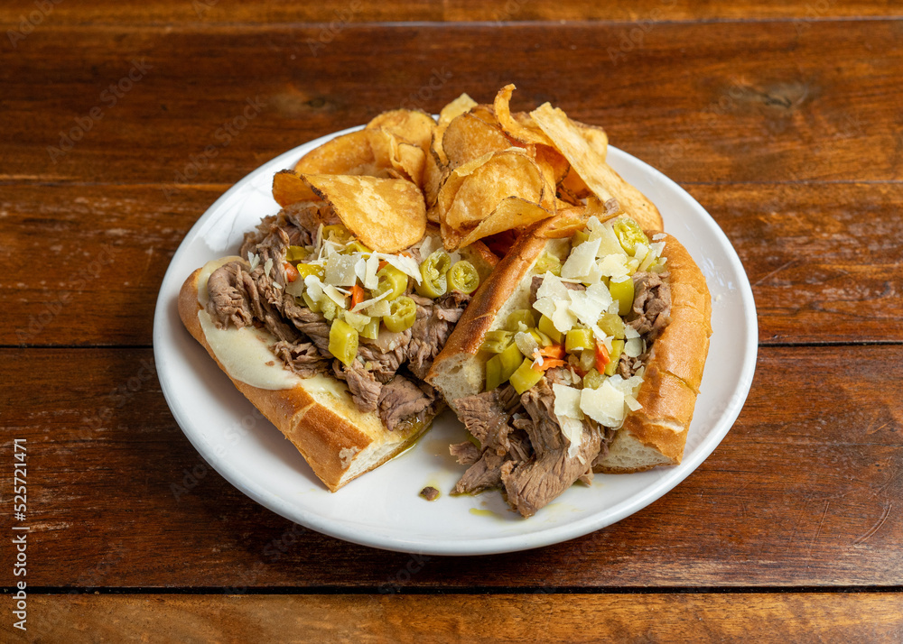 Roast beef sandwich with potato chips Roast beef sandwich with potato chips