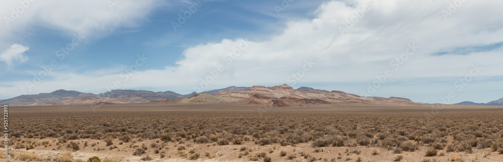 American Mountain Landscape in the desert. Sunny Cloudy Sky. Nevada, United States of America. Nature Background Panorama