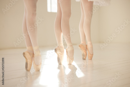 Ballet, dance and toe shoes with a dancer, ballerina and performance artist in a studio for training, practice and rehearsal. En pointe, technique and skill with artistic dancing and movement