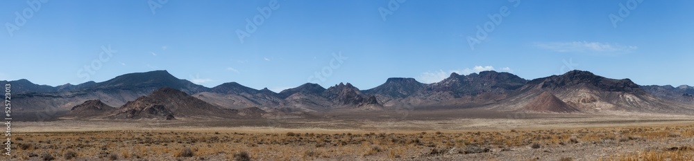 American Mountain Landscape in the desert. Sunny Cloudy Sky. Nevada, United States of America. Nature Background Panorama
