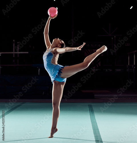 Woman dancing on floor in sport competition, training performance with ball in arena and dancer doing dance at social event or concert. Professional athlete doing gymnastics for exercise and health
