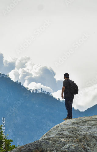 hiker on top of mountain