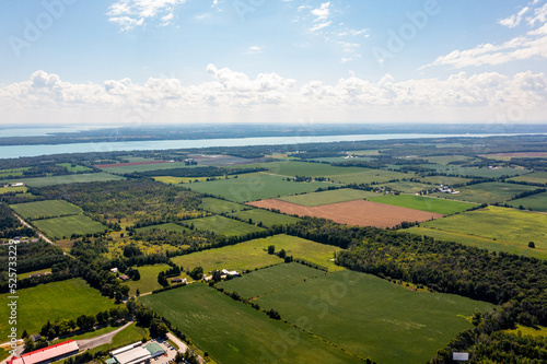 Innisfil water front beach shore line with farm land and lake simco in view  photo