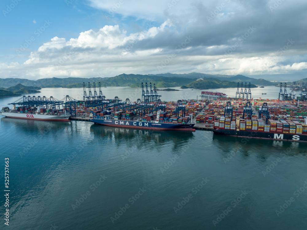 Fototapeta premium Shenzhen ,China - Circa 2022: Aerial view of container ship in Yantian port in Shenzhen city, China