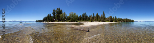 Panoramic View of Beach at Lake surrounded by Mountains and Trees. Summer Season. Sugar Pine Point Beach, Tahoma, California, United States. Sugar Pine Point State Park. Nature Background.