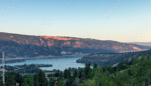 Canadian Landscape during sunny sunrise. Taken in Lake Country, near Vernon, BC, Canada. Nature Background. photo