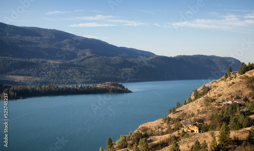 Scenic View of Kalamalka Lake during sunny summer sunrise. Vernon, British Columbia, Canada. Nature Background Panorama