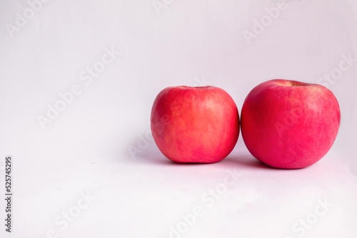 Two Red Fuji Apples in White Isolated Background