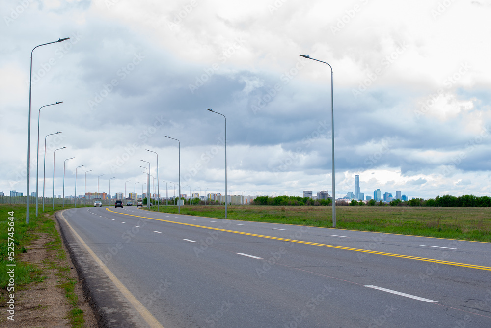 Fototapeta premium perspective of paved road and sky before rain