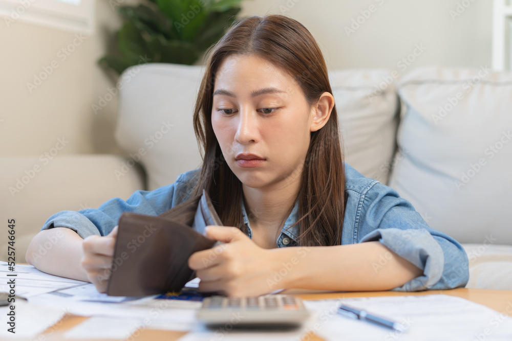 Stressed, Problem business person woman holding and open empty wallet, purse no have money for bill payment, credit card loan or expense. Bankruptcy, bankrupt or debt financial, mortgage concept. Stressed, Problem business person woman holding and open empty wallet, purse no have money for bill payment, credit card loan or expense. Bankruptcy, bankrupt or debt financial, mortgage concept.