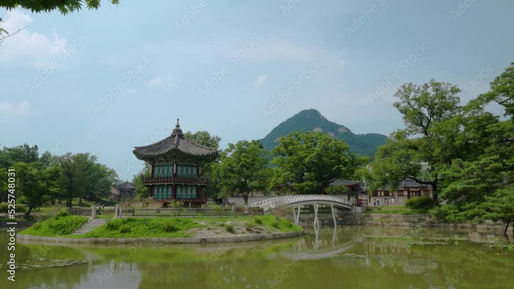 Hyangwonjeong Pavilion and Lake Hyangwonji of Gyeongbok Palace - panning shot, Seoul, South Korea Hyangwonjeong Pavilion and Lake Hyangwonji of Gyeongbok Palace - panning shot, Seoul, South Korea