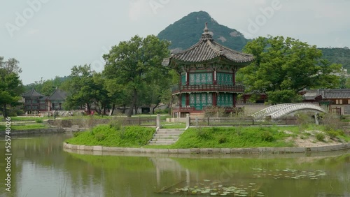 View of Hyangwonjeong pavilion in Gyeongbokgung royal palace in summer, Seoul, South Korea -pannign shot photo