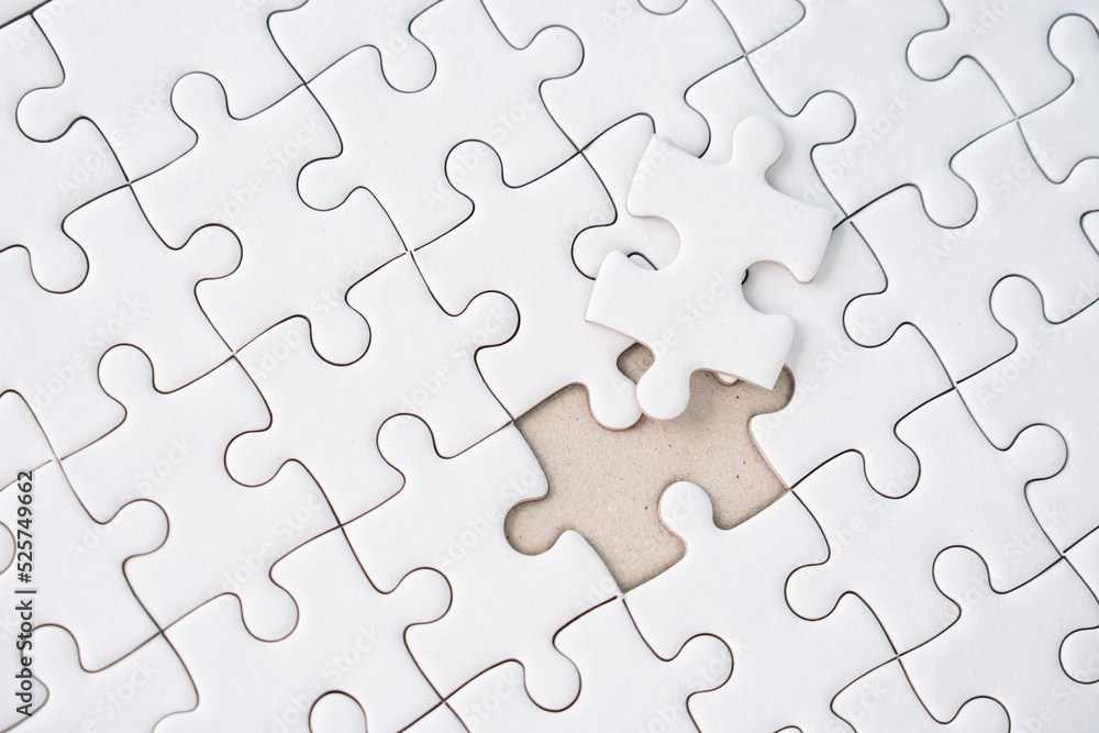 White jigsaw puzzle background for business concept of strategy solution White jigsaw puzzle background for business concept of strategy solution