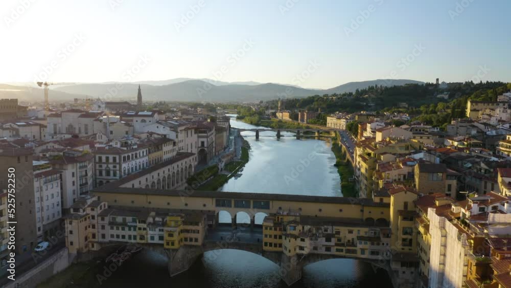 Aerial Pullback Reveals Ponte Vecchio Bridge and Arno River at Sunrise Aerial Pullback Reveals Ponte Vecchio Bridge and Arno River at Sunrise