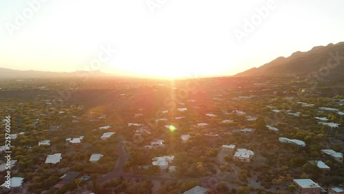 Amazing drone shot of homes and houses at sunset in Catalina mountains in Tuscon Arizona