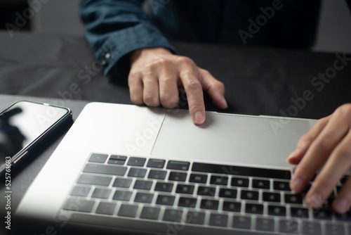 Person are using laptops, working or studying online at home. businessman using laptop work outside the office
