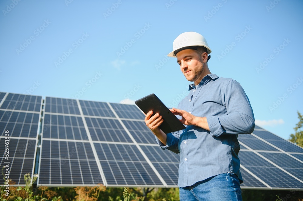 The solar farm(solar panel) with engineer check the operation of the system, Alternative energy to conserve the world's energy, Photovoltaic module idea for clean energy production The solar farm(solar panel) with engineer check the operation of the system, Alternative energy to conserve the world's energy, Photovoltaic module idea for clean energy production