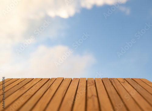 concept image wooden floor and blue sky
