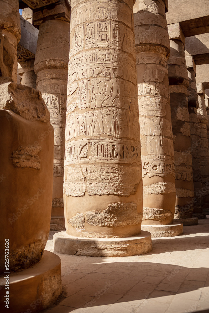 Different hieroglyphs on the walls and columns in the Karnak temple. Karnak temple is the largest complex in ancient Egypt.